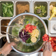 Overhead view of the Sweetgreen salad station full of toppings
